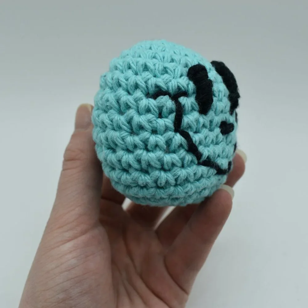 Handcrafted crochet catnip happy face cat toy